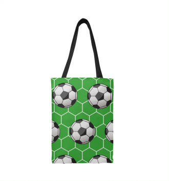 Сумка-шоппер Футбольные мячи на зеленом фоне